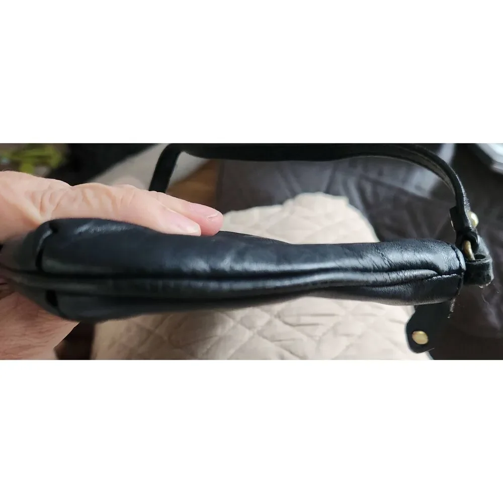 Coach Ashley large black leather wristlet. Approx 9.5 wide, 5.5 high